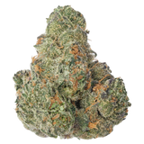 A close-up image of a cannabis bud with a snow-like appearance due to its white trichomes.