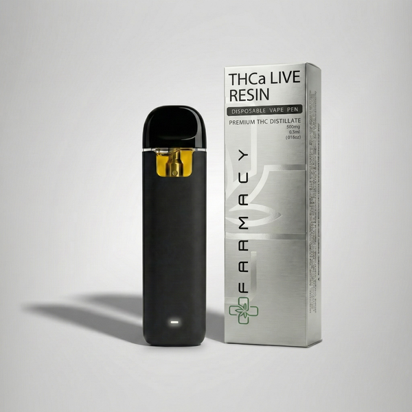 Black vape pen with gold accent next to its packaging on a gray background Official Farmacy Live Resin Vape